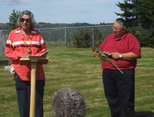 Elder Douglas Knockwood and MDCC staff member Gerald Gloade offer prayers in a celebration of remembrance at St. Brigid’s Cemetery in Parrsboro, NS. The Mi’kmawey Debert Cultural Centre is committed to the continuation of these traditional practices.