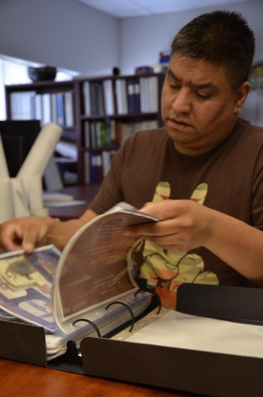 Photo archive assistant Trevor Gould (Paqtnkek First Nation) enjoyed taking a walk through the past with Elsie.