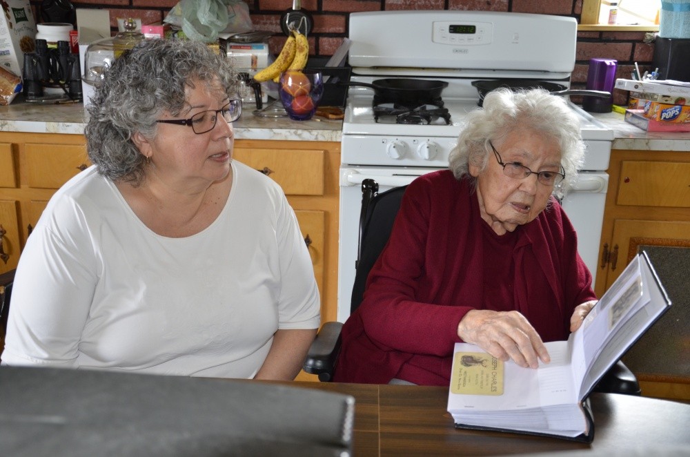 Elsie and her daughter Marty loved the new conservation binders that will help preserve the collection.